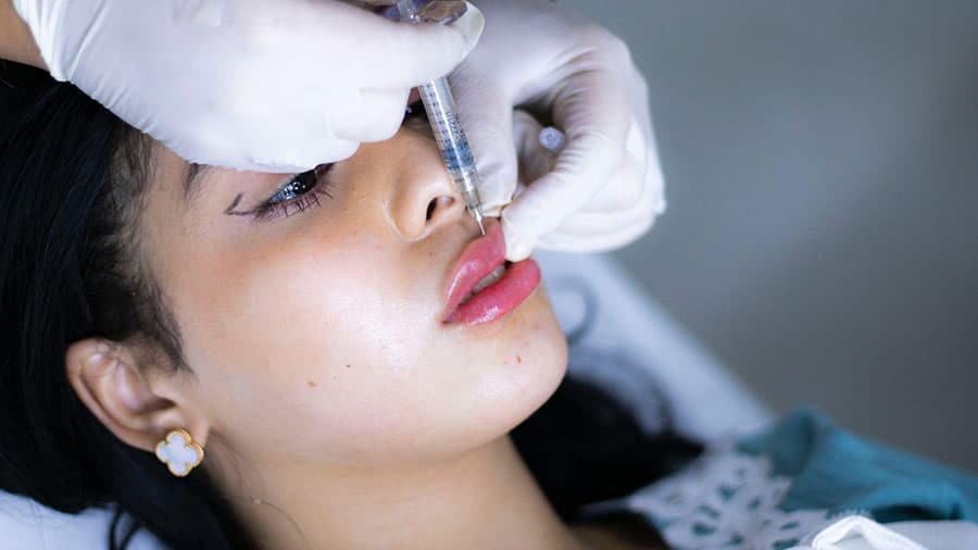 A lip enhancement procedure includes getting injections.